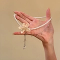 Elegant pearl necklace with large beaded flower charm and dangling silver chains - Necklace (Silver-Khaki-White)