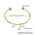 Detailed view of golden stainless steel open bangle with imitation pearl and beads - Artificial Pearl Decoration (Z040) / Gold