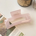 Pink translucent rectangular claw clip with matte finish on a minimalist desk - 8.5cm / Pink