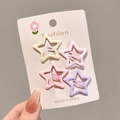 Set of four star-shaped hair clips in pastel yellow, pink, and purple on a white card - 1# Simple Kids Star Hair Clip