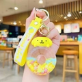 Cute yellow Pompompurin keychain with liquid donut charm and Good Luck strap - Donut Quicksand - Yellow Dog