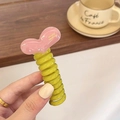 Yellow spiral phone line hair tie featuring a pink heart pendant and handmade text - Macaron Pink [Candy Heart]