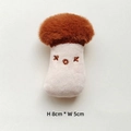 Detail of 8cm mushroom plush charm with faux fur cap and XOX embroidery on white background - King Oyster Mushroom