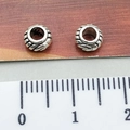 Pair of 8mm Tibetan silver spacer beads with braided texture and measuring ruler - Twisted Pattern Spacer Bead
