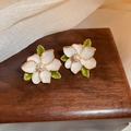 Vintage flower earrings with cream petals, green leaves and pearls on wood - White Enamel Pearl Flower Studs