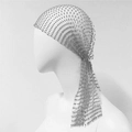Sparkly silver rhinestone mesh headpiece with long tassel fringe on mannequin head - Gray