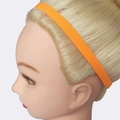 Vibrant orange elastic sports headband shown on model for yoga and running - Orange