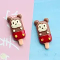 Detail shot of cute monkey popsicle resin charm with size 1.5x3.5cm for DIY crafts - Red Monkey Popsicle