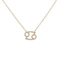 Close-up of golden zodiac necklace featuring a sparkling Cancer sign pendant with zircons - Gold Cancer