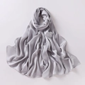 Close-up of silver-grey chiffon silk shawl showing soft texture and elegant drape - Light Gray