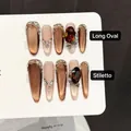 Luxury amber cat-eye press-on nails with gemstone accents in oval and pointed styles - Extra Small XS / Long Oval