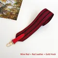 Detail of red and black geometric wide strap with wine red leather and gold hooks - Wine Red with Red Trim