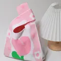Pink and white knitted gift bag with floral patterns and soft heart-shaped details - Heart Flower Pink