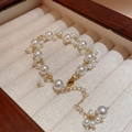 Cluster pearl bracelet with gold chain and extension, displayed on a jewelry tray - Multi-layer Cluster Pearl Style (White)