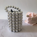 Detail of silver beaded bucket bag with handmade metallic pearls and satin pouch - Silver