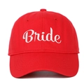 Detail showing white script Bride embroidery on a classic red cotton baseball cap - Bride (BRIDE) / Red
