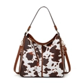 Vintage shoulder tote bag featuring brown cow print pattern and adjustable gold strap - Brown Cow Print