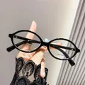 Lunettes anti-lumière bleue ovales classiques avec monture noire brillante pour une protection - Monture noir brillant