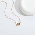 Elegant gold chain necklace featuring a mystical evil eye pendant with black stones - Black Zirconia Eye