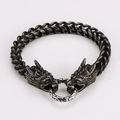 Detailopname van vintage armband met dubbele drakenkop van roestvrij staal metaal - Zwart