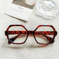 Monture de lunettes de soleil hexagonale oversize avec motif écaille de tortue rétro - Marbré Crème Verres Transparents