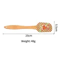 Silicone Christmas spatula with wooden handle featuring Merry Christmas gingerbread design - Striped Gingerbread House Style