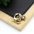 Close-up of gold snake and anchor pendant with colorful micro-paved cubic zirconia - Anchor Snake Colorful Style