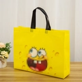 Vibrant yellow non-woven shopping bag featuring a cartoon sponge pattern and black handles - Yellow Sponge Style / Horizontal 27*32*10cm