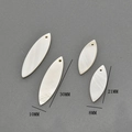 Macro view of marquise-shaped natural white shell charms for DIY jewelry making - Horse Eye Small
