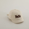 Close-up of high-density twill cotton fabric and 3D NwDie embroidery on toddler cap - 48-50cm / Off White