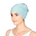 Detailed view of mint blue pleated turban hat showing soft knitted fabric texture - Mint Green