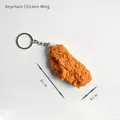 Realistic 8cm fried chicken wing keychain with golden crispy texture and metal ring - Fried Chicken Wing (With Keychain)