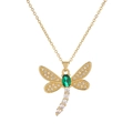 Macro detail of golden dragonfly pendant necklace with green gemstone and white zirconias - Dragonfly Oval Green Gemstone Pave Style (CN001919YH)