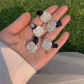 Set of five white pearl resin rose hair clips with black metal clips on grass - Pearly Camellia (5pcs Set)
