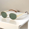 Retro oval sunglasses with gold metal frame and dark green lenses on reflective stand - Gold Frame Dark Green Lens (Leopard Leg)