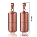 Macro detail of rose gold pill pendant with dimensions 33mm height and 9mm width - Rose Gold
