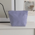 Blue and white striped seersucker makeup bag with a durable metal zipper closure - Navy Striped