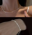 Elegant silver sparkling choker necklace and bracelet set with fine shimmering texture - Necklace & Bracelet Set / Silver