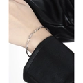 Minimalist S925 sterling silver open bangle with molten lava texture on female model - 925 Silver / White Gold