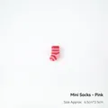 Miniature pink and red striped knitted Christmas stocking for dollhouse and DIY crafts - Mini-Pink Stripe