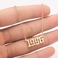 Detail of 1996 gothic year pendant in gold finish on a delicate stainless steel chain - 1996 / Gold