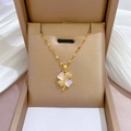 Detailed view of lucky four-leaf clover necklace with shell inlay and pavé stones - Gold Iridescent Four-Leaf Clover