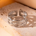 Adjustable silver woven mesh ring made of titanium steel on a neutral stone background - Steel Color 38
