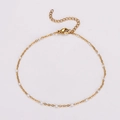 Detail of golden stainless steel anklet with white beads and adjustable lobster clasp - White