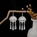 Silver ethnic leaf tassel earrings with concentric circular motifs in a classic folk style - Silver Concentric Circle Fan Tapered Tassel Style (E1821-1)