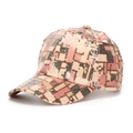 Close-up of sparkling sequin grid pattern on a stylish baseball cap with pink and gold tones - Pink Gold Black Checkered (B)