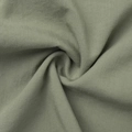Detailed macro view of olive green linen fabric texture with a natural woven structure - S / 49% Rayon 17% Cotton 34% Nylon