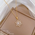 Detailed shot of golden sunflower necklace with center pearl and sparkling zircon petals - Golden Sun Flower Pearl Zircon Style (A325)