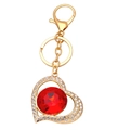 Portachiavi a cuore dorato con grande cristallo rosso e strass su sfondo bianco - Oro