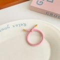 Pink woven elastic hair tie with gold metal ends and knotted candy color design - Pink